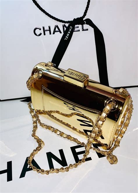 chanel gold mirror clutch price|Chanel clutch with hand strap.